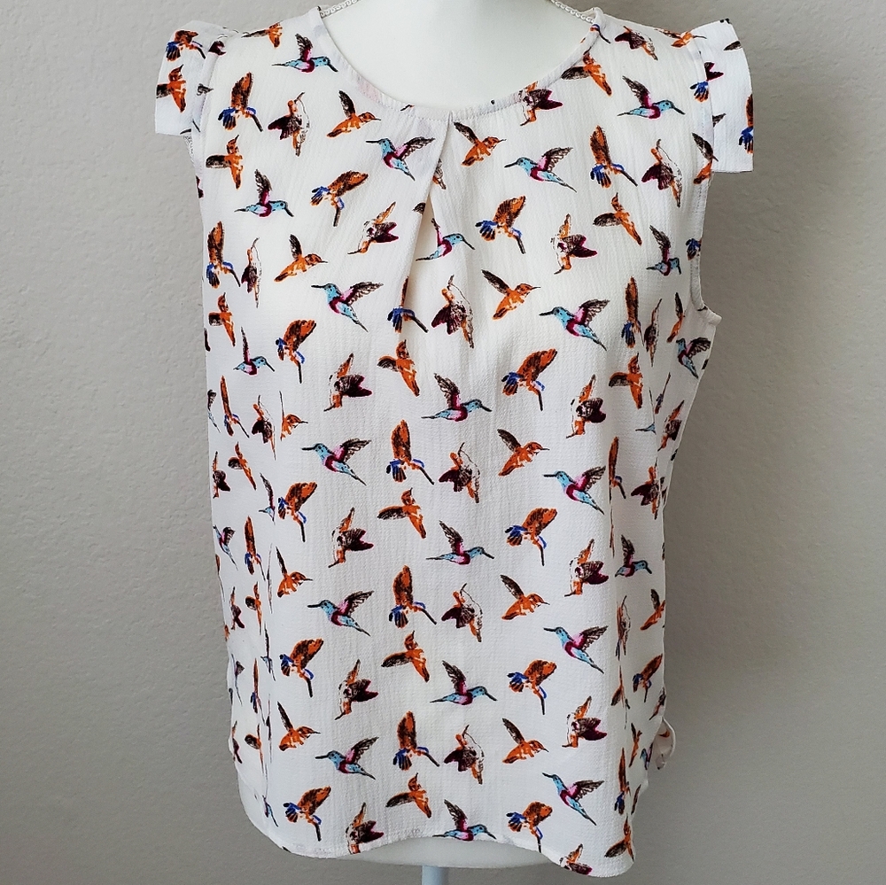 Hummingbird motif top